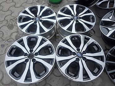 Комплект из 4 оригинальных литых дисков Subaru. Характеристики: -
