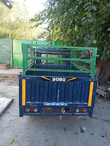 грузовые электромобили: Электрический грузовой трицикл BOBO с откидным кузовом Характеристики — 5