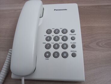 kabelsiz ev telefonlari: Stasionar telefon Panasonic, Simli, İşlənmiş, Ünvandan götürmə