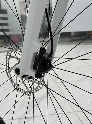 Городские велосипеды: Велосипед TWITTER LEOPARD PRO Карбон. 29”. Shimano Deore 12S — 10
