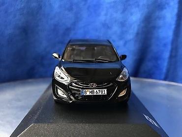 Avtomobil modelləri: Коллекционная модель Hyundai i30 5 door black 2012 Limited Edition — 14