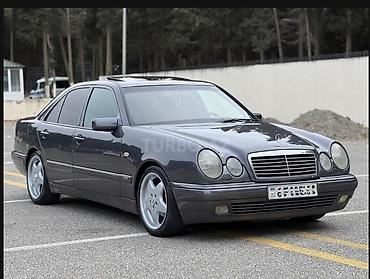 opel astra amartizator: Mercedes-Benz E-Class: 2.4 l | 1998 il Sedan — 8