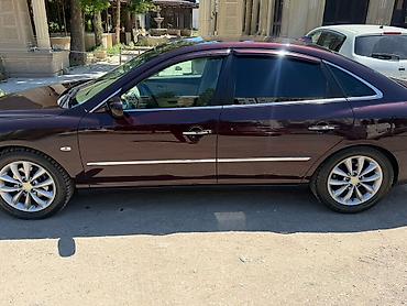 Hyundai: Hyundai sedan - Korpus: bənövşəyi-bordo rəng, xrom ön barmaqlıq və — 3