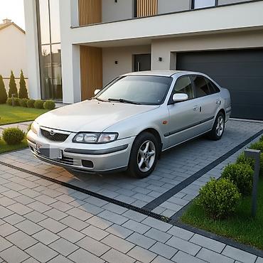 15: Mazda 626: 1998 г., 1.8 л, Механика, Бензин, Хэтчбэк — 5