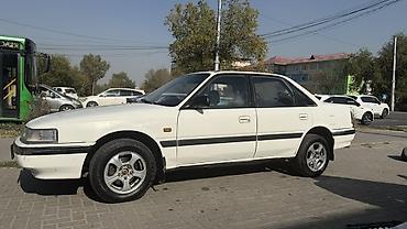 автомобильное зу: Mazda 626: 1990 г., 2 л, Механика, Бензин, Седан — 3