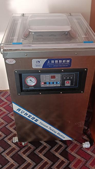 Упаковочно-фасовочные аппараты: Камерный вакуумный упаковщик Shanghai Dinglian Machinery Описание: - — 3