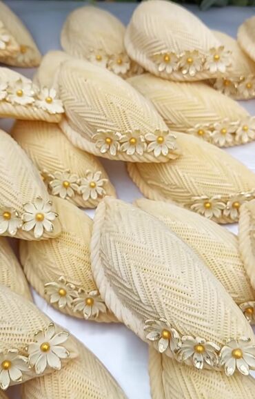 Un: Milli şirniyyatlar – əl işləri - Şəkərbura: Xəmir üzərində incə — 25