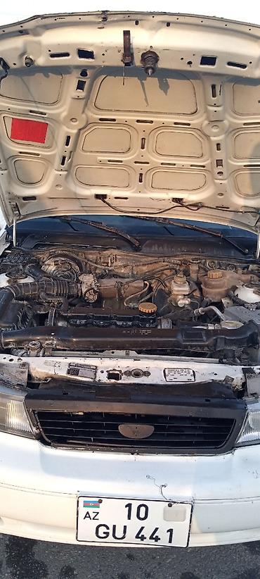 guzgu: Model: Daewoo Nexia, ağ sedan Xüsusiyyətlər: - Kuzov: 4 qapılı sedan — 6