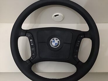 rul: Qara rəngli, BMW loqolu dəri sükan. Sükanın hər iki tərəfində