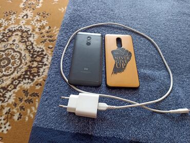 ноудбук бу: Смартфон Xiaomi Redmi 4X черного цвета с предустановленной