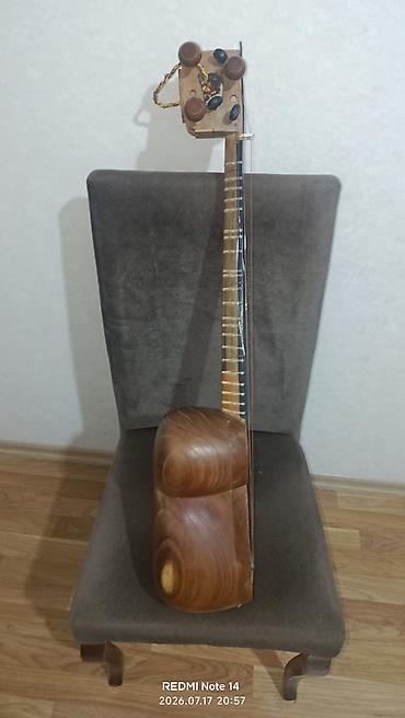 tar: Tarın səsi aydın və gözəldir Çanağı oyma tut ağacıdır qolu qoz — 3