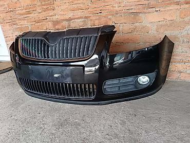 servis abs: PREDNJI BRANIK CRNI ZA ŠKODA FABIA OD 2007. DO 2010. GOD. | Prednji — 1