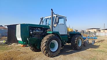 Другие тракторы: Трактор Т150 с оборотным плугом мала и арычник Характеристики и — 1