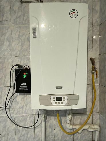 Продажа коттеджей и домов: Кирпичный дом в Новопокровке. - Планировка: 5 комнат, общая площадь — 12