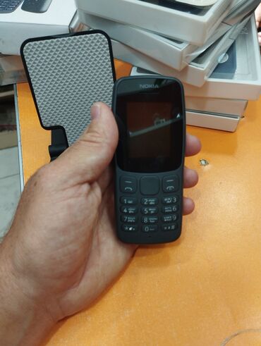 nokia 8600 satilir: Nokia 106, цвет - Черный, Гарантия, Кнопочный, Две SIM карты