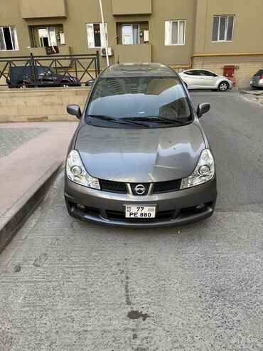 Водный транспорт: Nissan wingrad, boz rəng, sedan/hetçbek gövdə tipli şəhər avtomobili