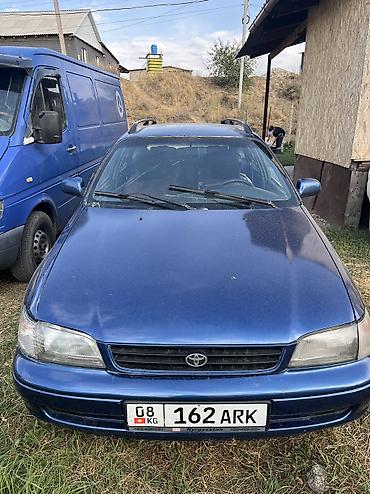 серв машина: Toyota Carina E: 1997 г., 1.8 л, Механика, Газ, Универсал — 1