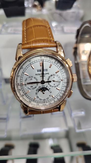 saat omega: Patek Philippe Geneve kişi qol saatı – klassik üslubda, çoxfunksiyalı — 5