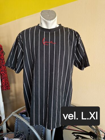 duks nov xl: T-shirt XL (EU 42)