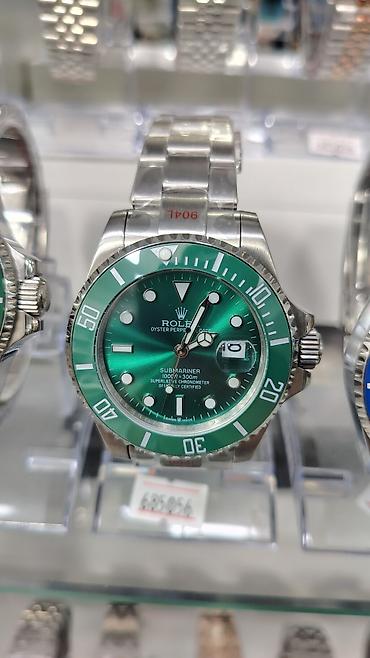 Aksesuarlar: Rolex saat kolleksiyası – vitrində təqdim olunan modellər: - Rolex — 7