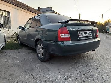 мазда протеге: Mazda Protege: 2002 г., 1.6 л, Автомат, Седан — 10
