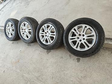 латор: Комплект из 4 зимних колес в сборе: шины 215/65 R16 на литых дисках — 1