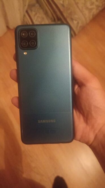 Samsung: Samsung Galaxy A12, 64 GB, rəng - Narıncı, Barmaq izi, İki sim kartlı, Face ID