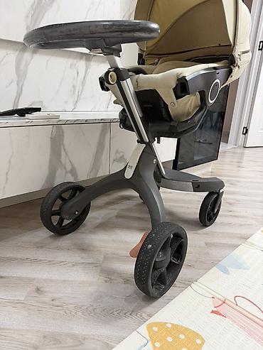 коляски анекс бу: Stokke brendi. 2300 azn alinib yeni kimi qalib. Tutacaqi yuxarida — 7