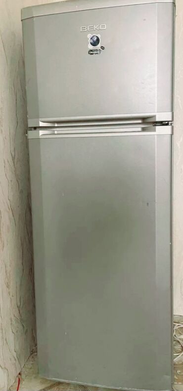 işdenmiş xaladenik: İşlənmiş 2 qapılı Beko Soyuducu Satılır, rəng - Boz, Təkərli