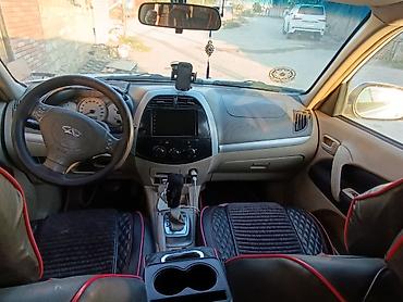 kia cerato 2012: Chery Tiggo (T11) krossover, ağ rəng. Texniki xüsusiyyətlər və — 4