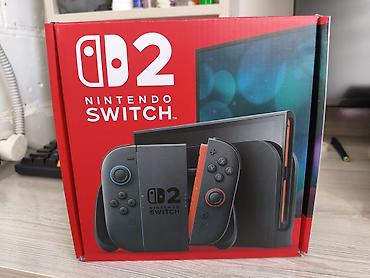 сенсорная доска: Продается новая Nintendo Switch 2 с док-станцией. Портативная игровая — 2
