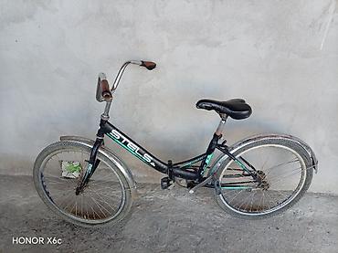velosipedlər isma: STELS Pilot 24 şəhər/komfort tipli velosiped.Nasosda üstündə verilir — 5