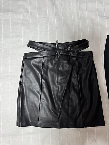 Ženska odeća: Mini suknje – crna pamučna i crna „eko koža“ (AMISU) - Modeli: dve — 2