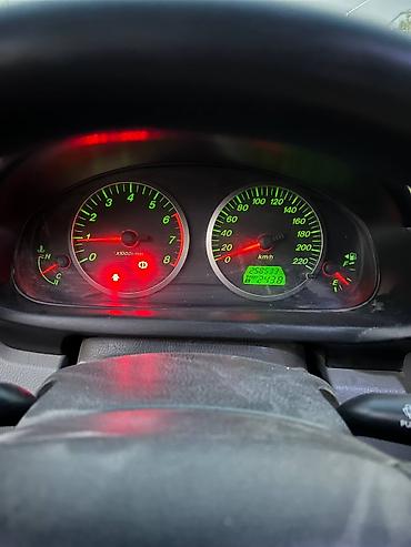 мата секыл: Mazda 2: 2003 г., 1.3 л, Кол менен иштөөчү, Бензин, Хетчбек — 7