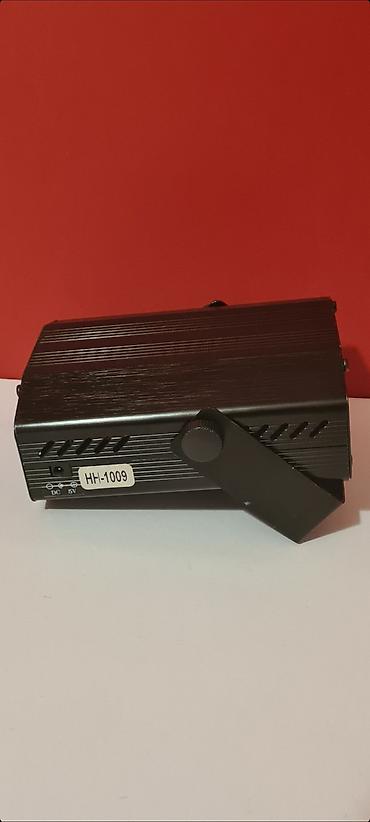 Projektori: - Mini Laser Stage Lighting najpopularniji light efekat. - Polovan — 5