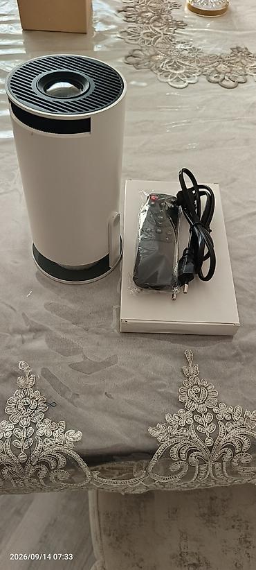 Mini portativ proyektor – silindrik dizayn, üst hissədə fokus linzası lalafo.az -da Mini portativ proyektor – silindrik dizayn, üst hissədə fokus linzası