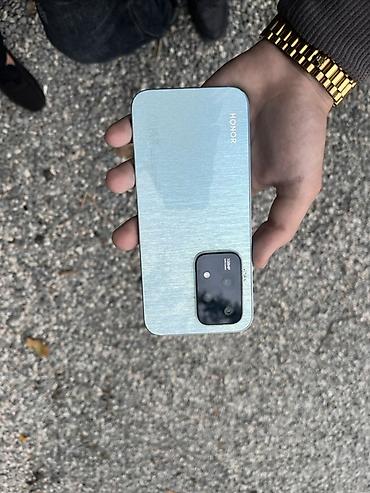 телефон fly li lon 3 7 v: Honor 200 Lite, 256 ГБ, цвет - Голубой, Отпечаток пальца — 1