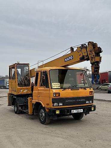 лабовой: Автокран, Nissan, 1994 г., 21 м — 1