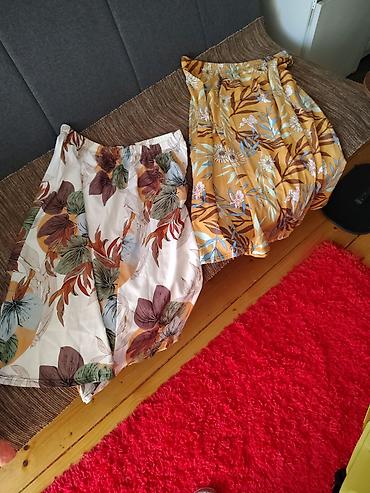 Letnje suknje sa tropskim printomAKCIJA!1200 DIN OBE SUKNJE! - Model