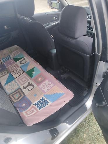 Mazda: Mazda 323: 2000 г., Универсал — 5