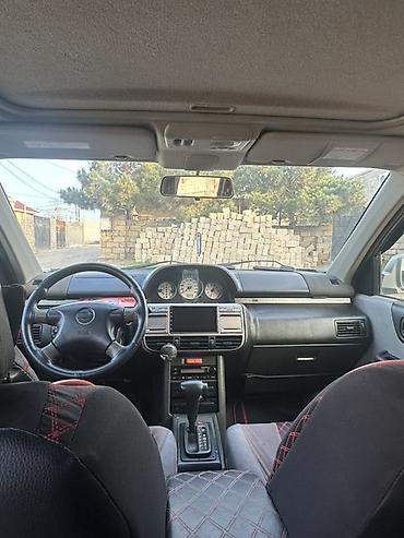 99 masin: Nissan X-Trail kompakt SUV modeli. Şəkillərdən göründüyü kimi gümüşü — 3