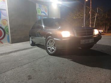 təkər evi: Mercedes-Benz 190: 2.3 l | 1992 il Sedan