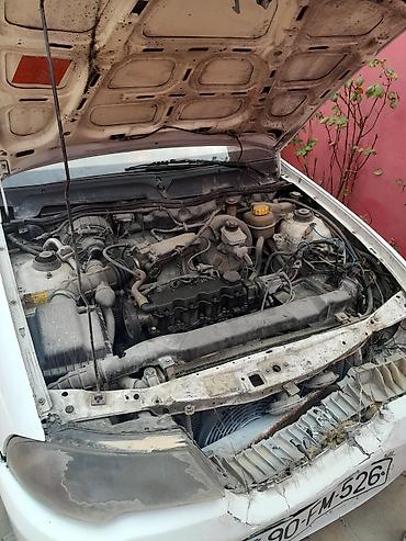 qaz otuz bir: Daewoo Nexia: 1.5 l | 2009 il Sedan — 1