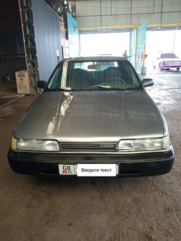 Mazda: Mazda 626: 1991 г., 2.2 л, Механика, Бензин, Седан