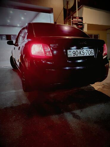 Kia: Kia Rio: 1.4 l | 2010 il Sedan — 26