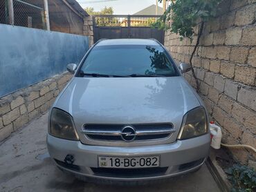 əllə çəkilmiş maşın şəkilləri: Opel Vectra 2004 1.9 dizel avtomat. universal modeli geniş salonu və