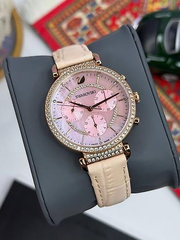 saat omega: Swarovski qadın qol saatı – roze qızılı tonlarda, zərif kristal — 7