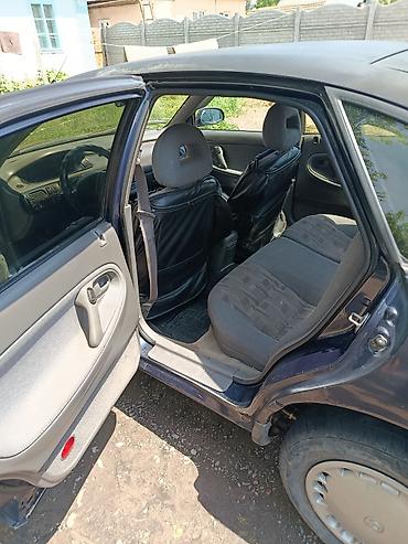 обвес 6 3: Mazda 626: 1994 г., 1.8 л, Механика, Бензин, Лифтбек — 6
