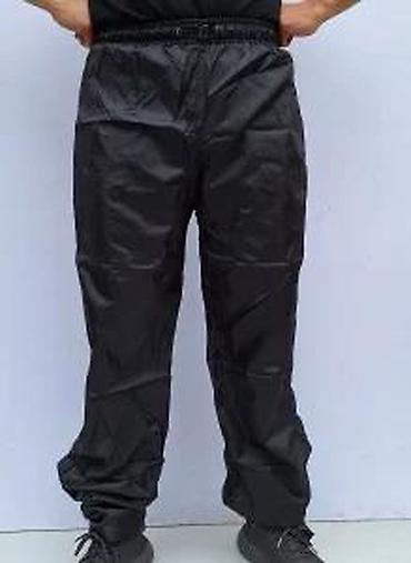 Ostali Kompleti, kombinezoni: Dvodelno kišno odelo u crno-crvenoj kombinaciji, dizajnirano za — 21