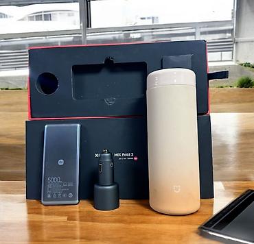машина xiaomi купить: Набор от Xiaomi Powerbank, Автомобильная зарядка, Термос Вся — 7